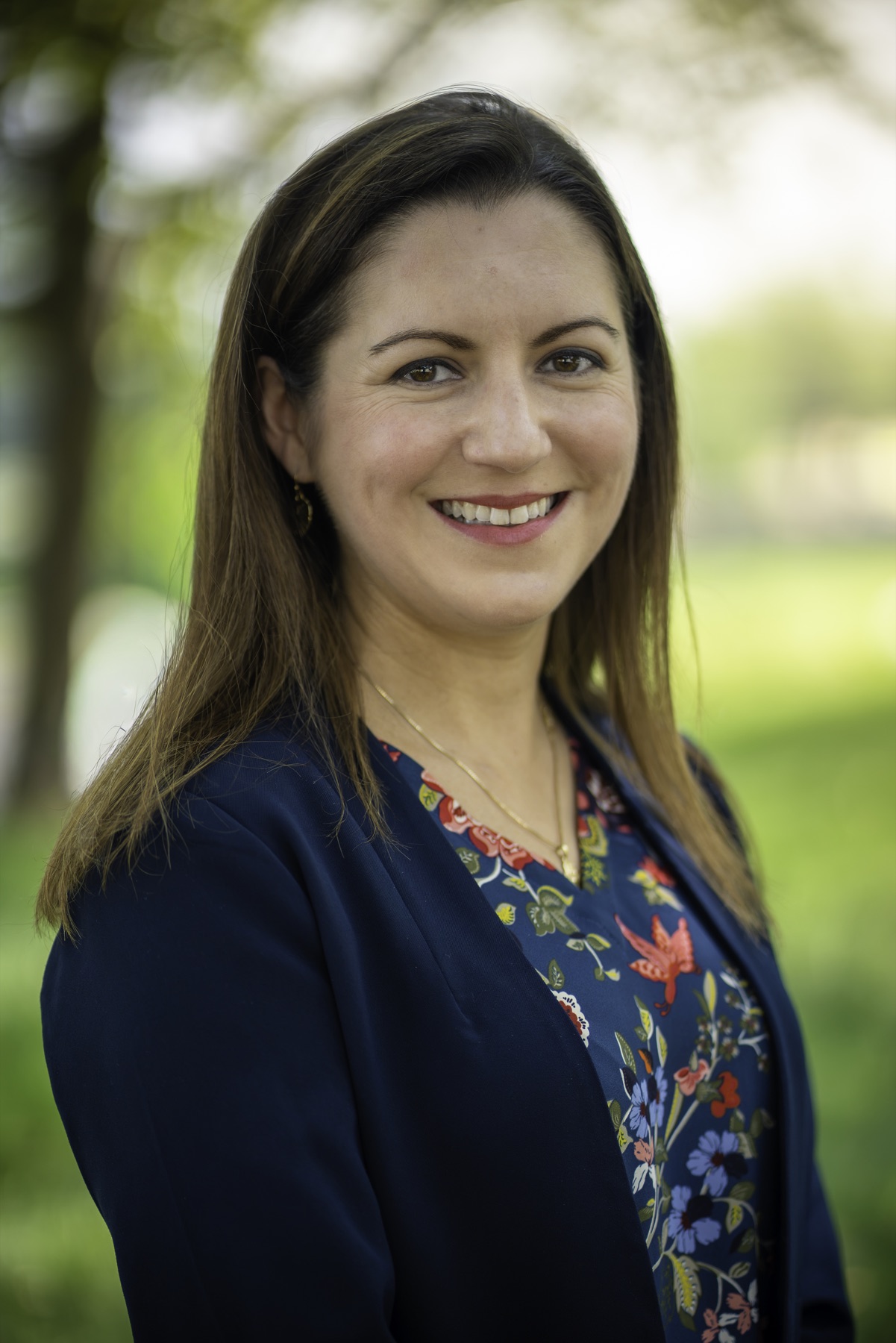Outdoor professional portrait in soft green light